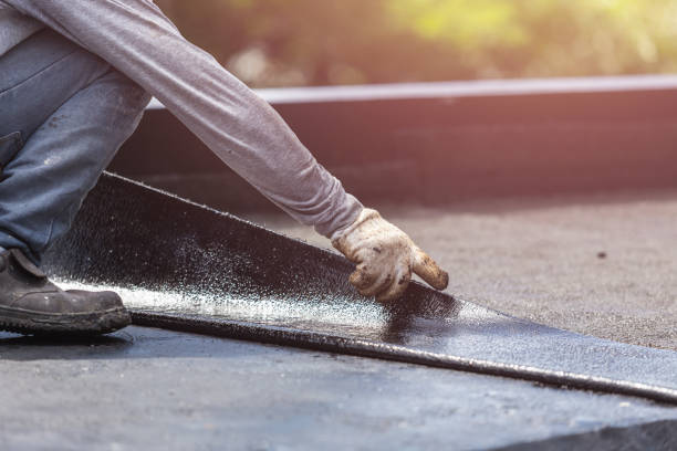 Professional Emergency Waterproofing technician working in Baltimore, MD
